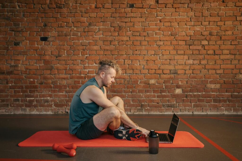 Person following AI-powered virtual fitness coach with real-time form feedback