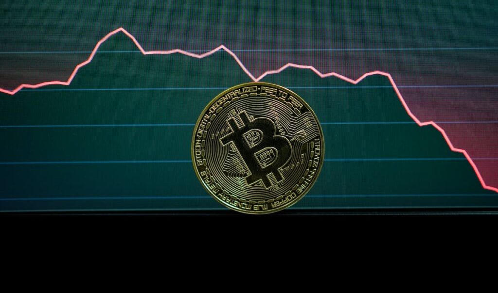 Bitcoin price crash chart showing 48% decline from $126,000 October 2025 peak to $66,000 February 2026